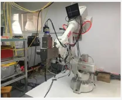 繊維のレーザ溶接のロボット システムABB Kuka Fanuc 6軸線のロボット腕   深さ0.04-6mm
